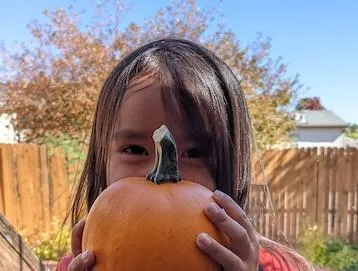 girl with pumpkin