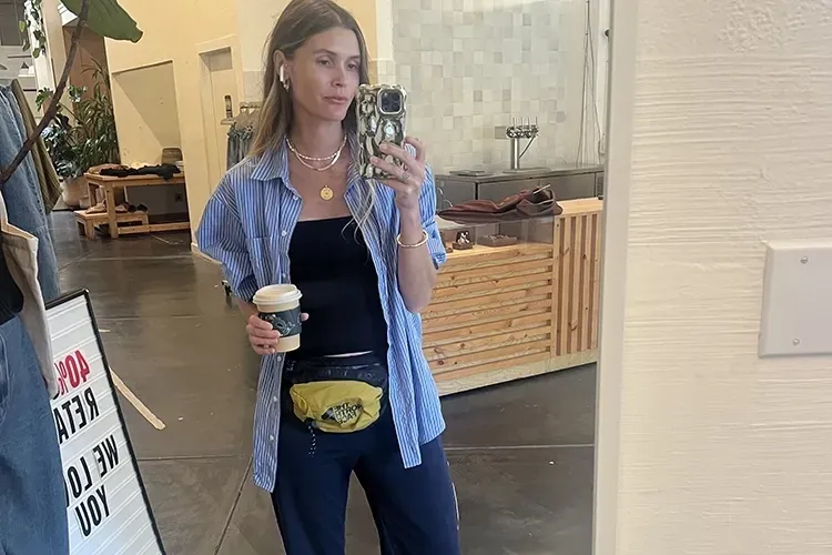 Morgan holding a smoothie mirror selfie