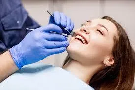 “Dental hygienist performing a professional cleaning at Osuna Dental Care in Albuquerque.”