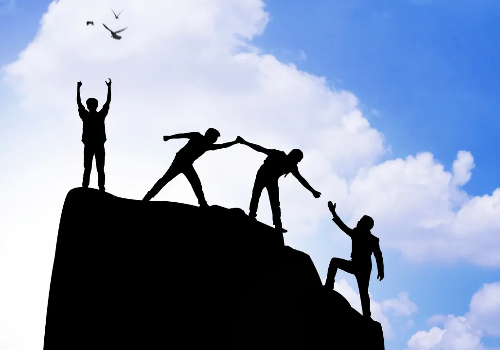 people climbing mountains