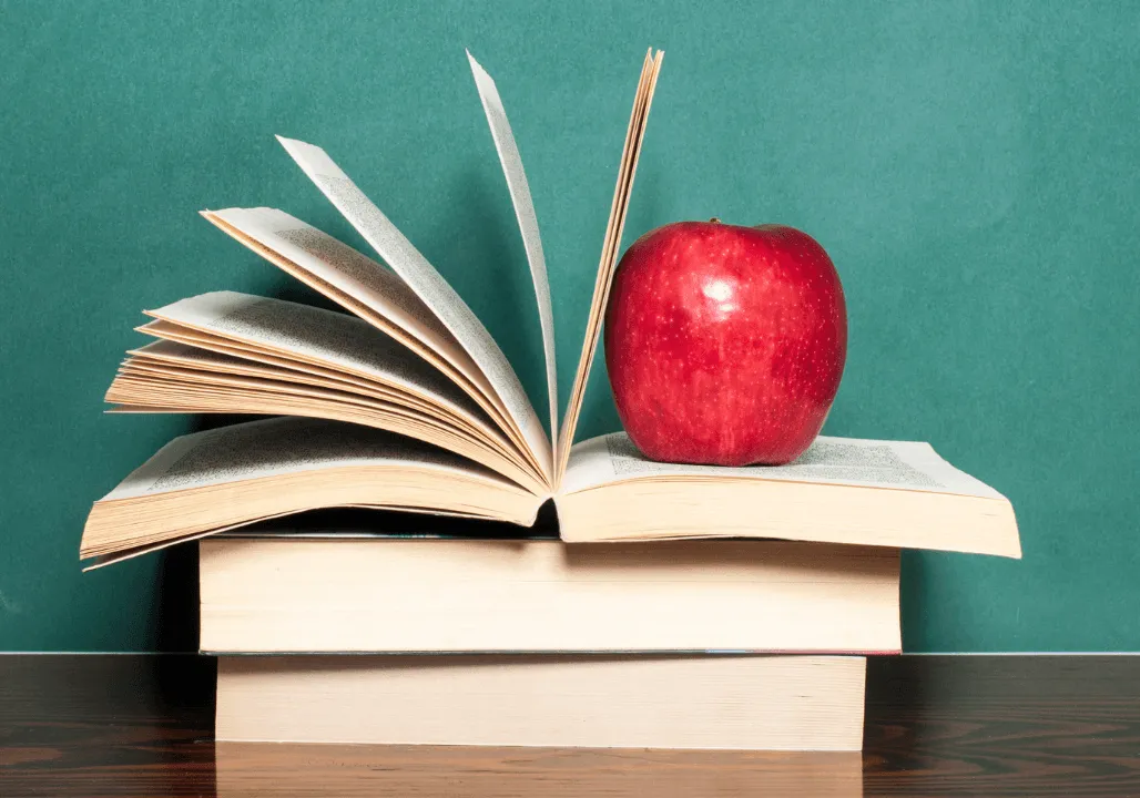 apple with physical books