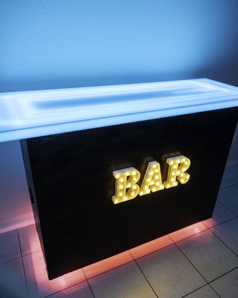 Lighted bar with illuminated BAR sign.