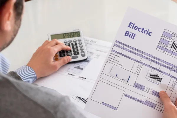 Man Calculating Energy Bill
