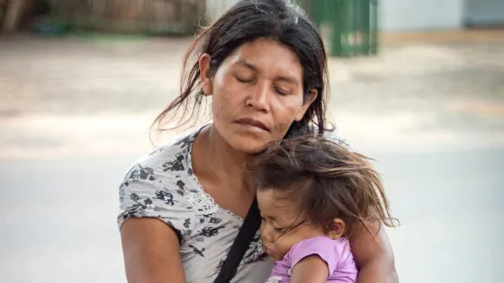 woman holding child