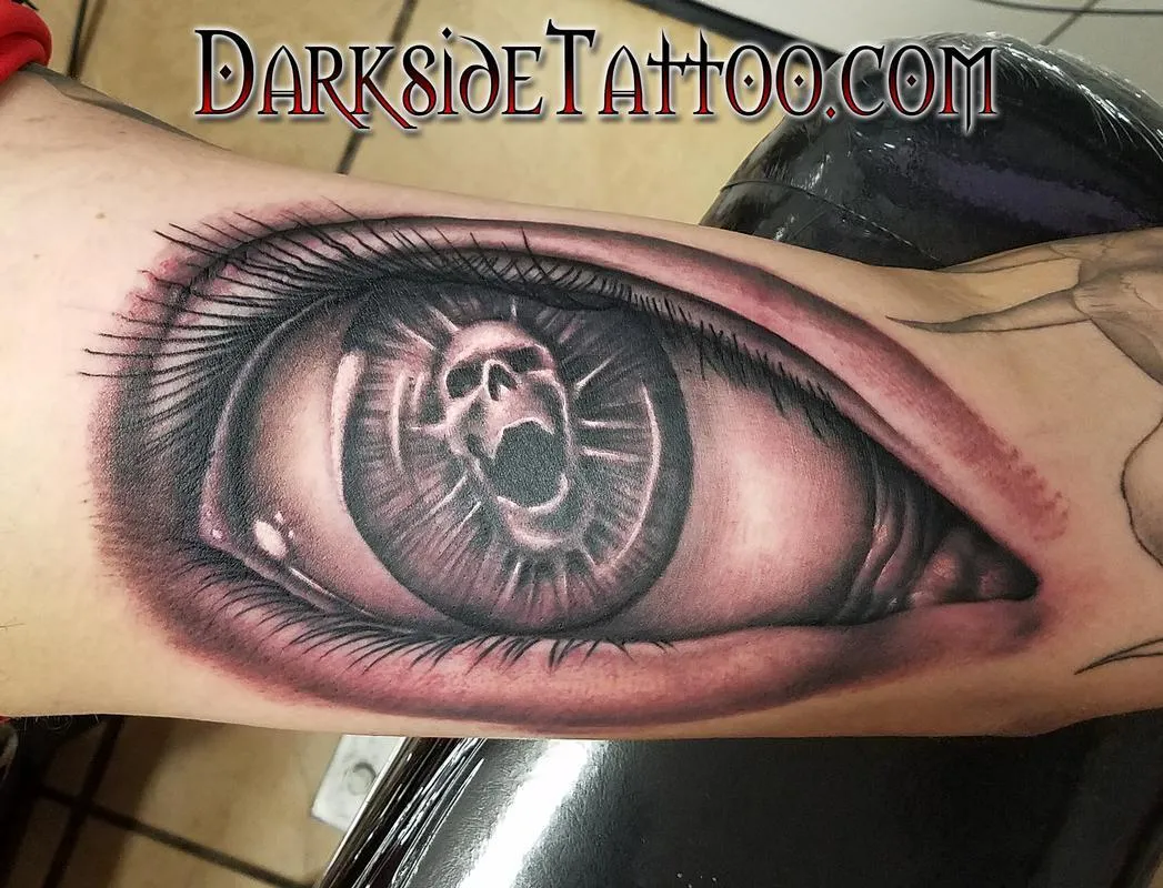 Black and Gray Skull Eyeball Tattoo
