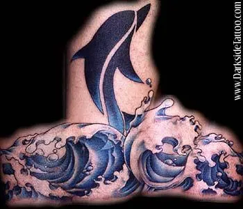 Tribal dolphin and waves