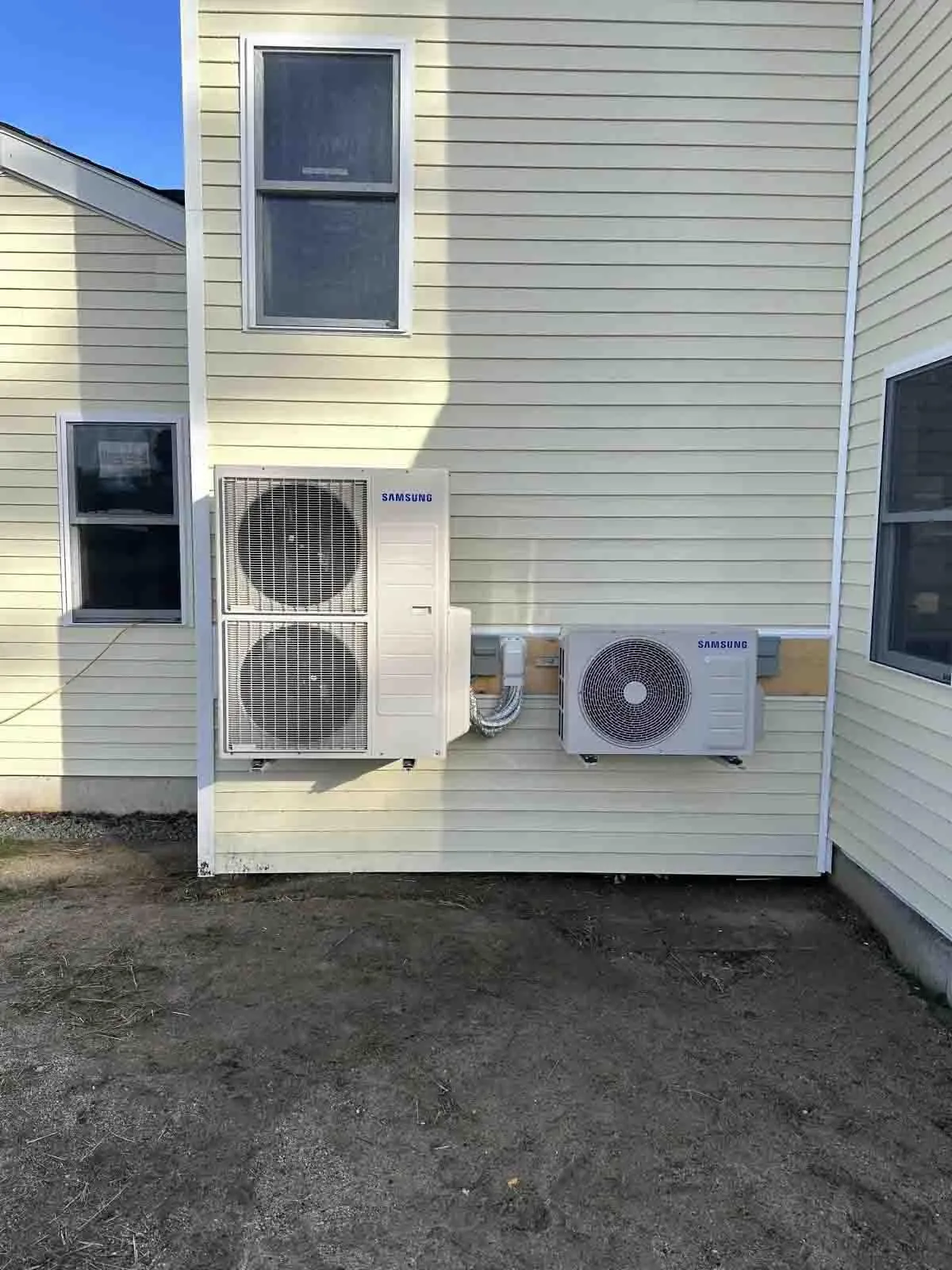 beige siding heat pump service in windham maine