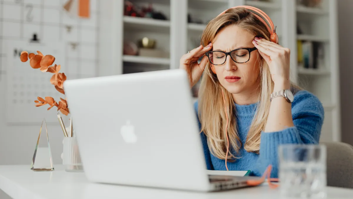woman stressed at computer
