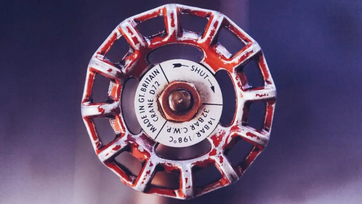 red knob to a water valve