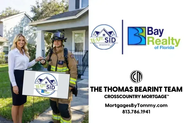 Tampa Bay firefighter holding house keys after buying home using Florida Hometown Heroes down payment assistance program