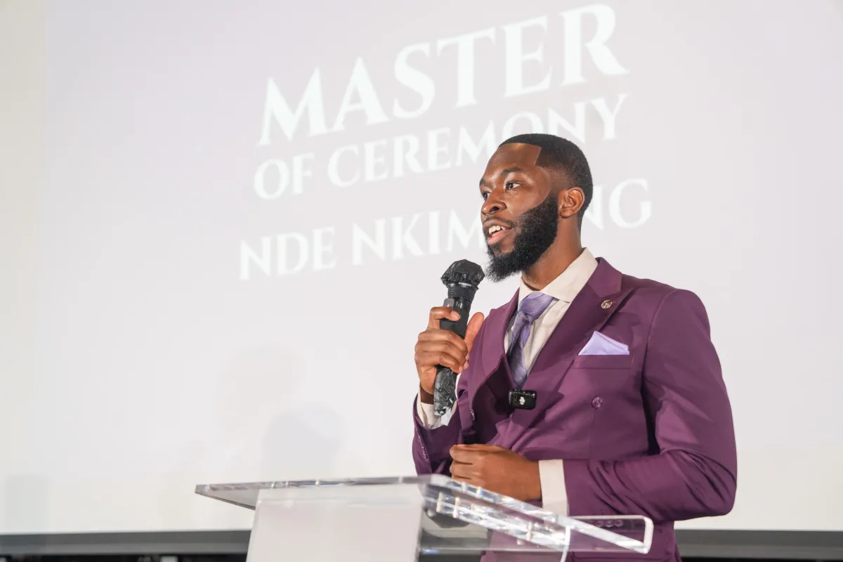 Corporate emcee hosting a conference from the stage