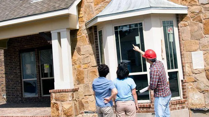 Home Inspector Showing Deficiencies to Buyers