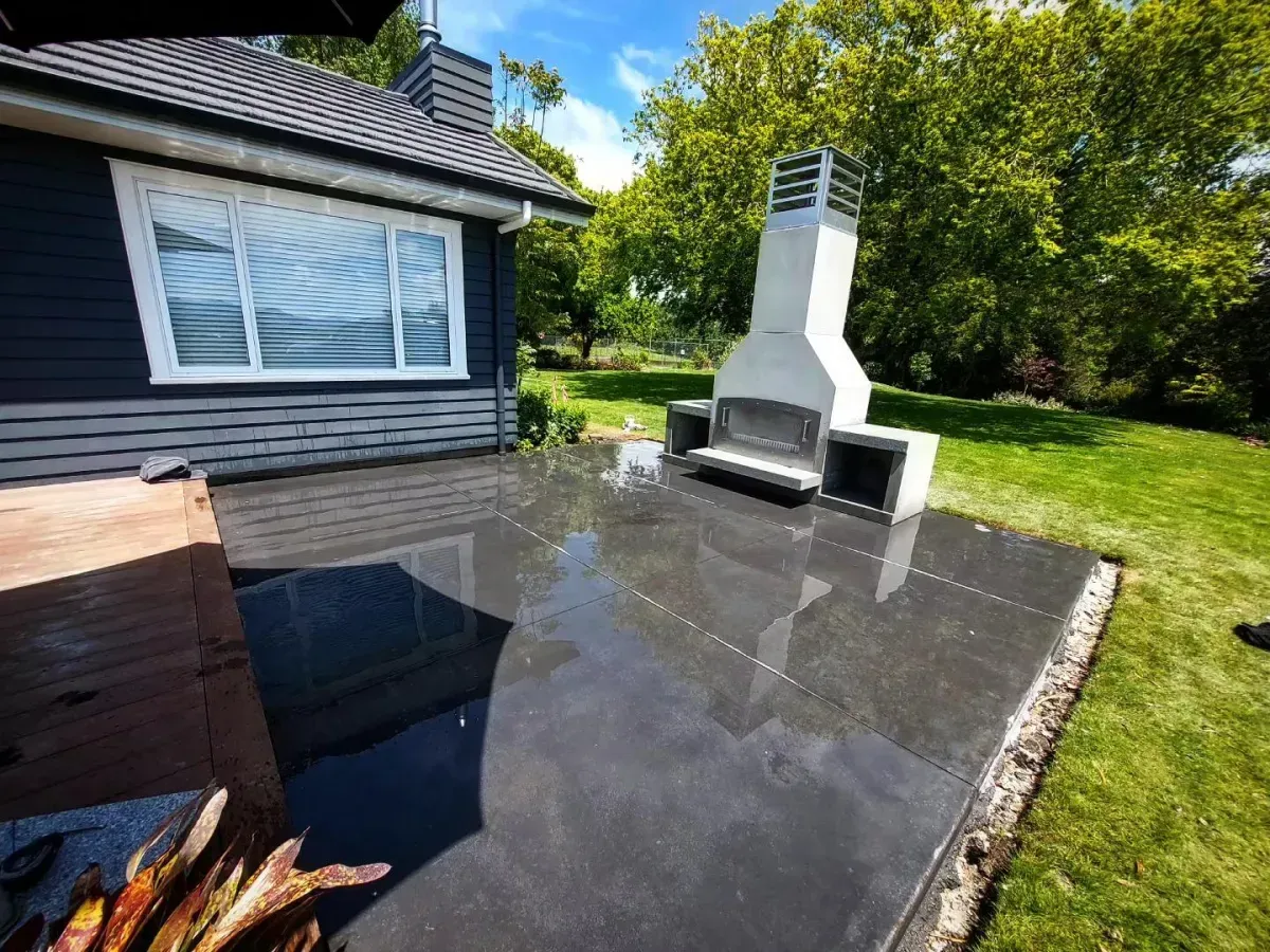 Outdoor stone tile flooring on a modern patio in Whanganui, designed for durability and style