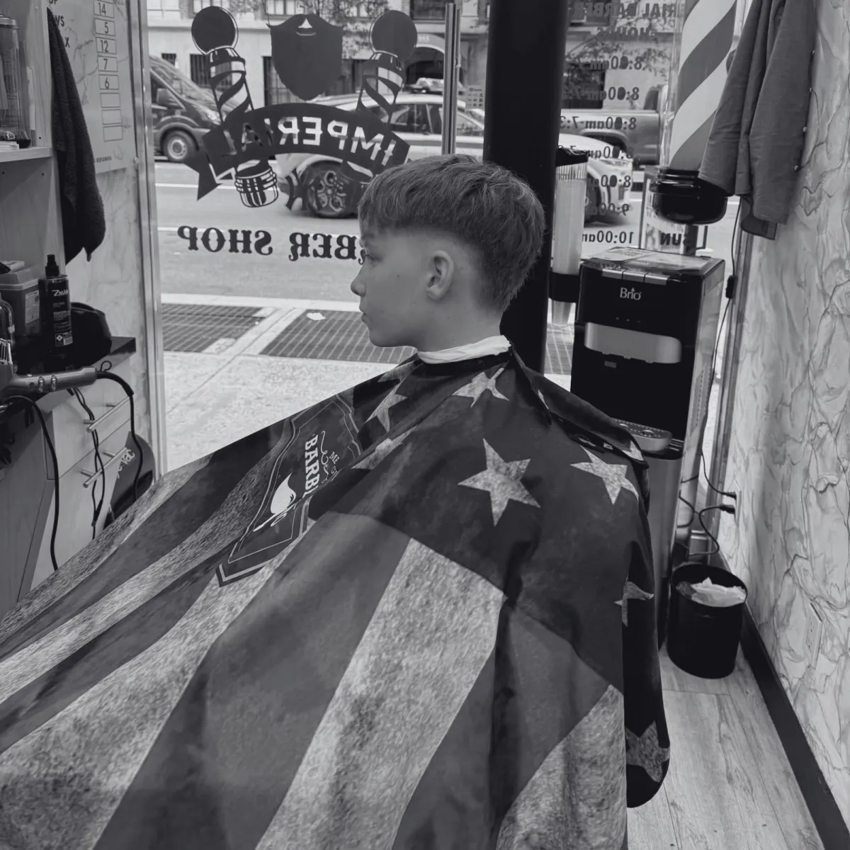 NYC barber styling a modern men’s haircut at Imperial Barbershop 2 NYC