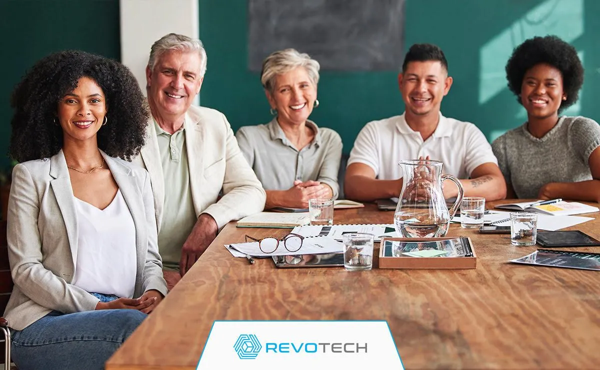 Group of board members in a non profit smiling while meeting