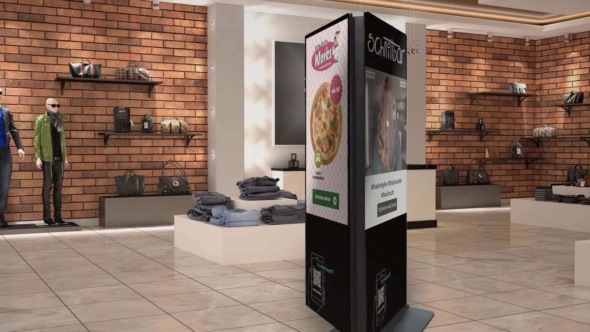 „TOUCHwall Werbestele in einem Einkaufszentrum – interaktives Display für Shopverzeichnis, Angebote, Wegweiser und digitale Werbung.“
