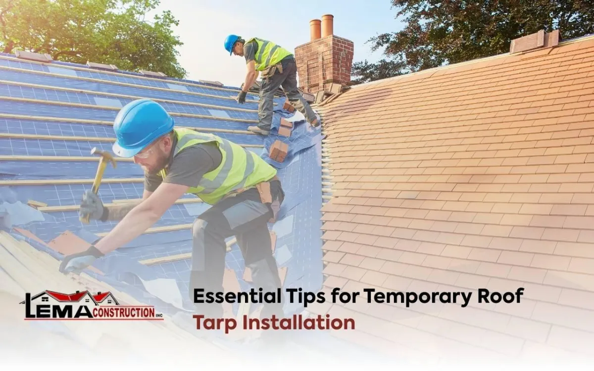 Temporary roof tarp installation covering storm roof damage