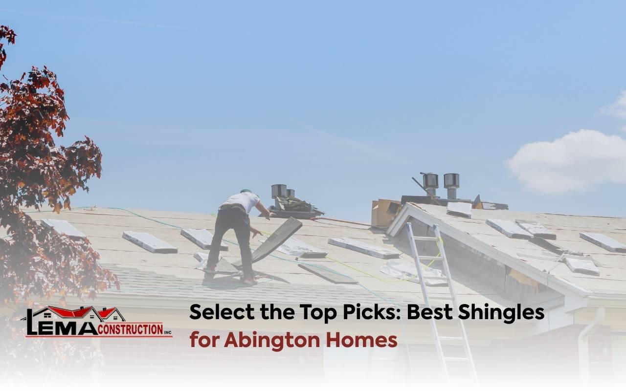 Professional installing asphalt shingles on an Abington home roof