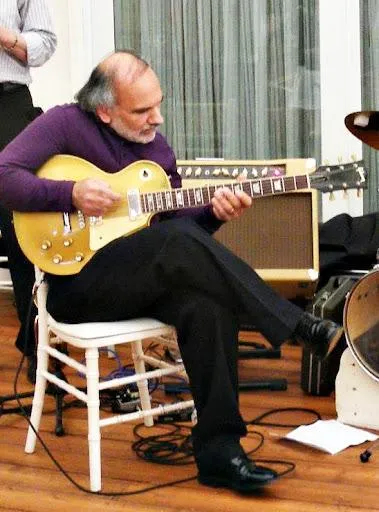 man playing guitar