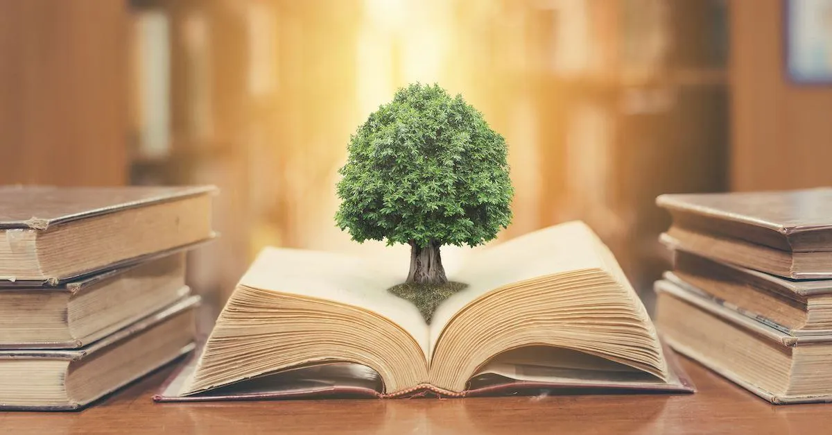 tree growing from a book