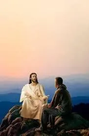 Jesus and man sitting with a sunset