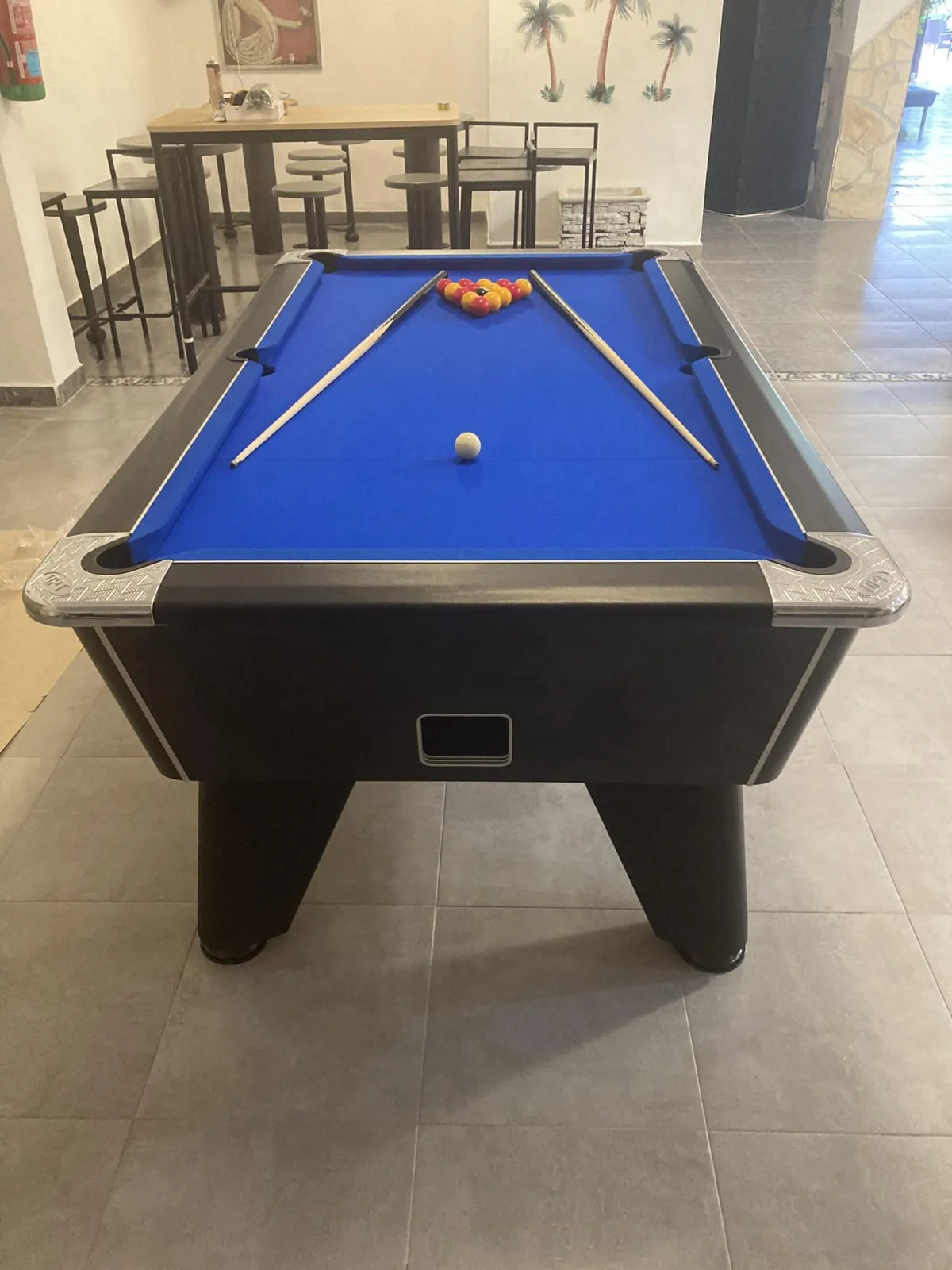 Black table with blue cloth