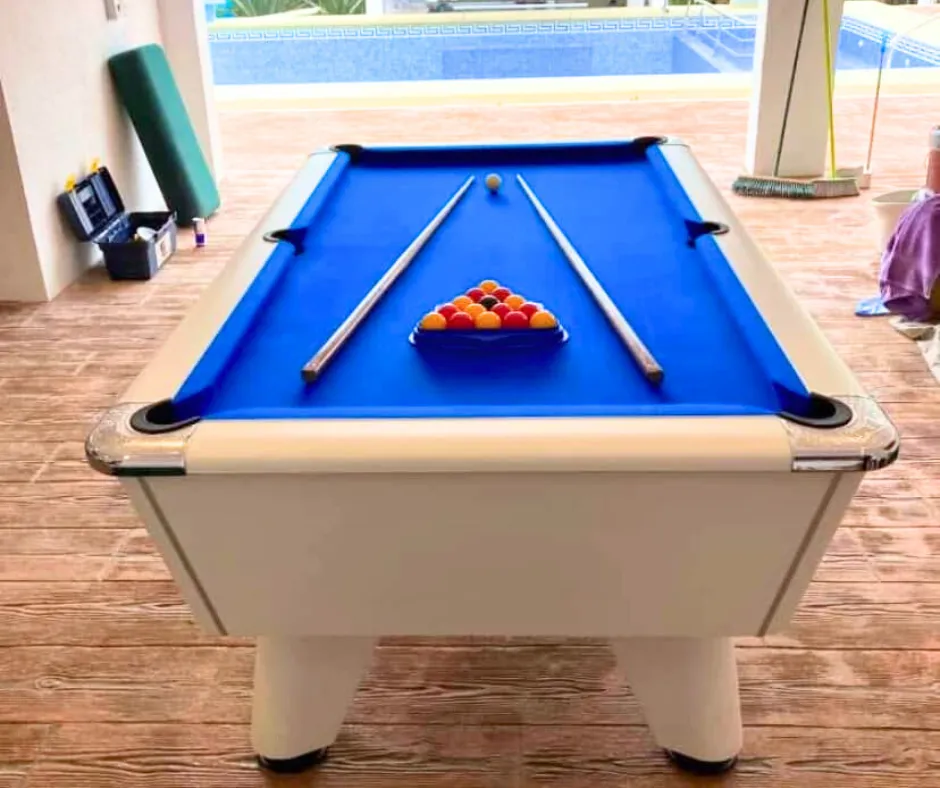 white pool table with blue cloth