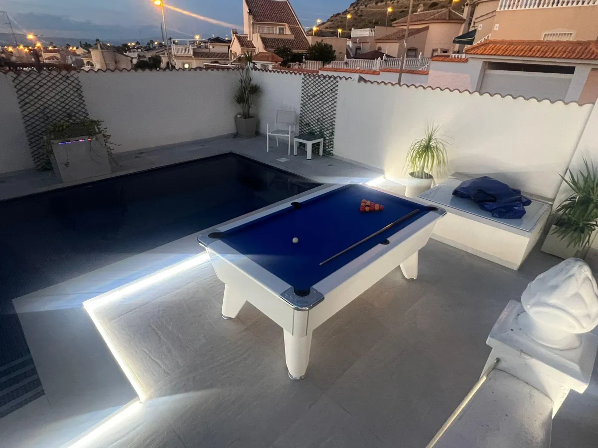 black pool table with green cloth