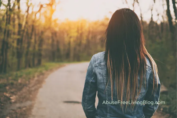 Woman Staring at a Road