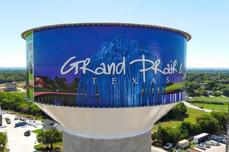 Aerial view of Grand Prairie, Texas neighborhoods showing established family homes—representative of the older properties families often sell as-is when transitioning aging parents to senior care.
