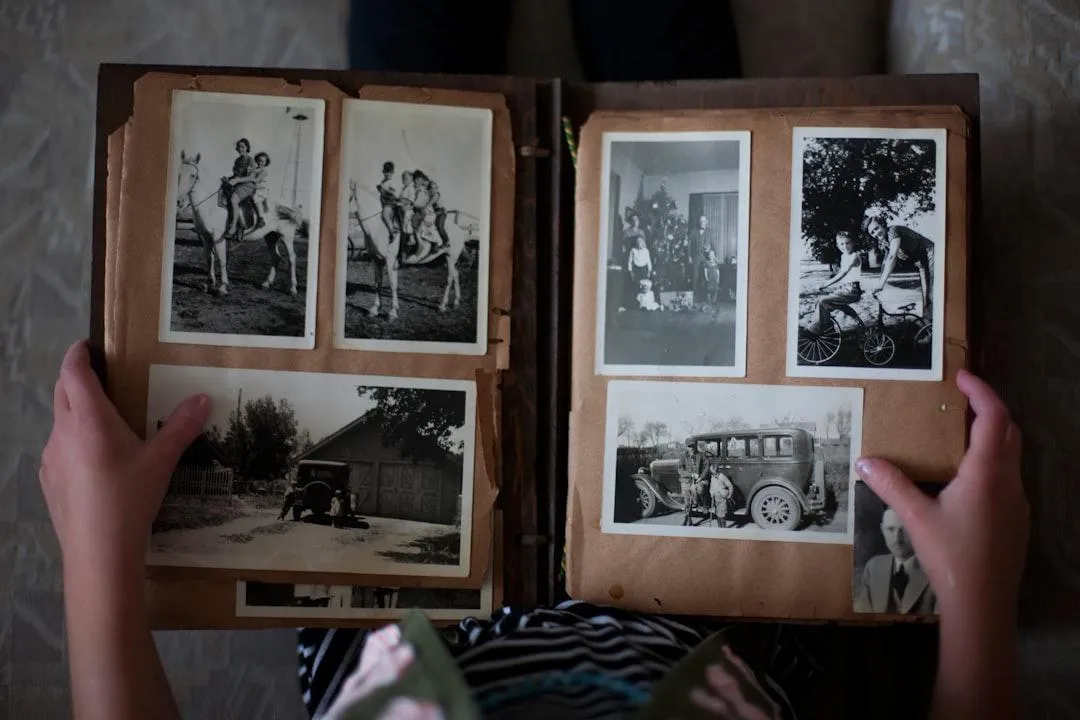 An adult daughter and senior parent holding an old trinket in a living room filled with boxes, symbolizing the memories and value inside the home.