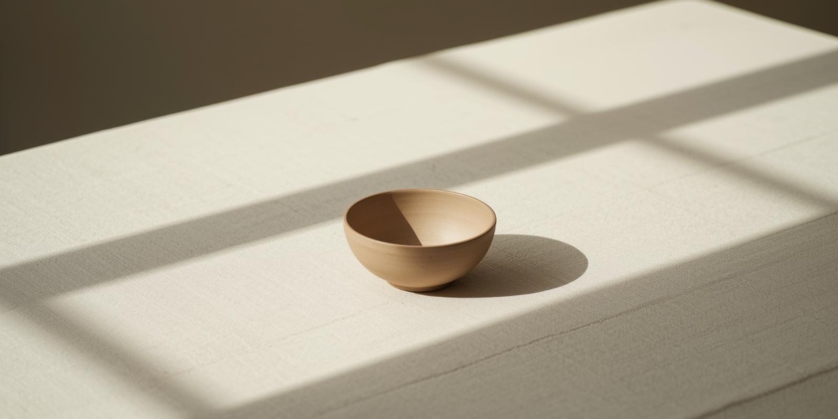 Editorial image of empty bowl on table with shawdow