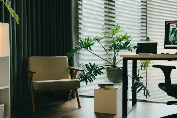 Computer, desk and two chairs