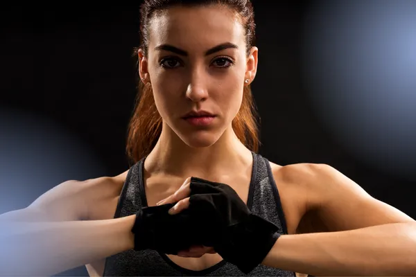 Mental toughness symbolized by a tough female wrestler