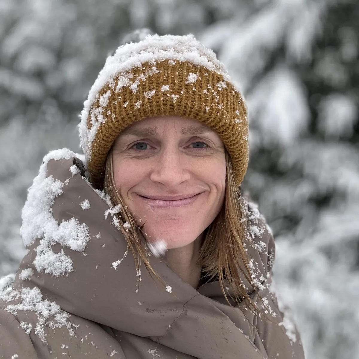 Amy Lobb covered in snow