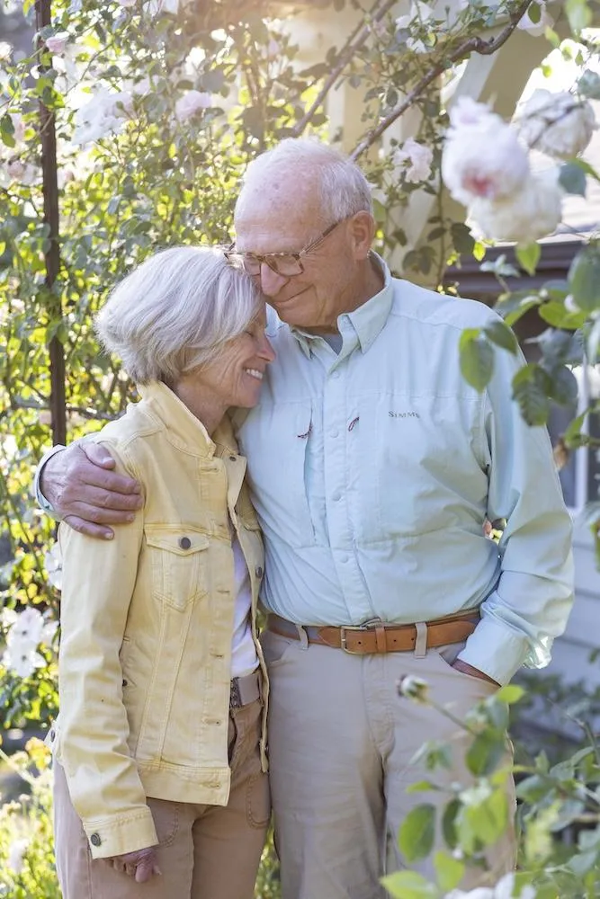 Couple photo in backyard Deep Cove on Vancouver Island