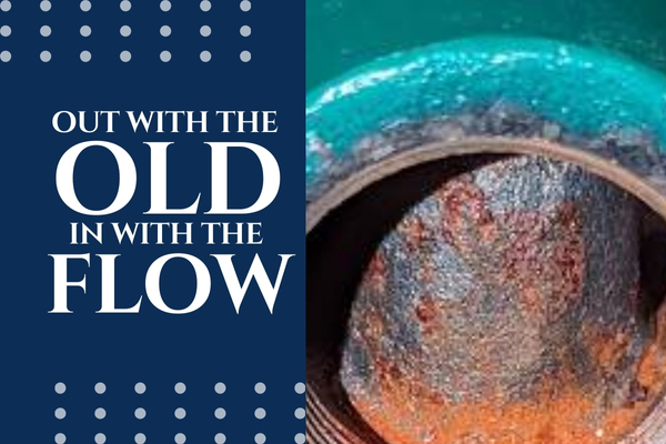 Old, rusted well pump next to a brand new replacement unit.