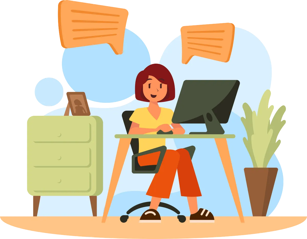 A woman working from home at a computer.