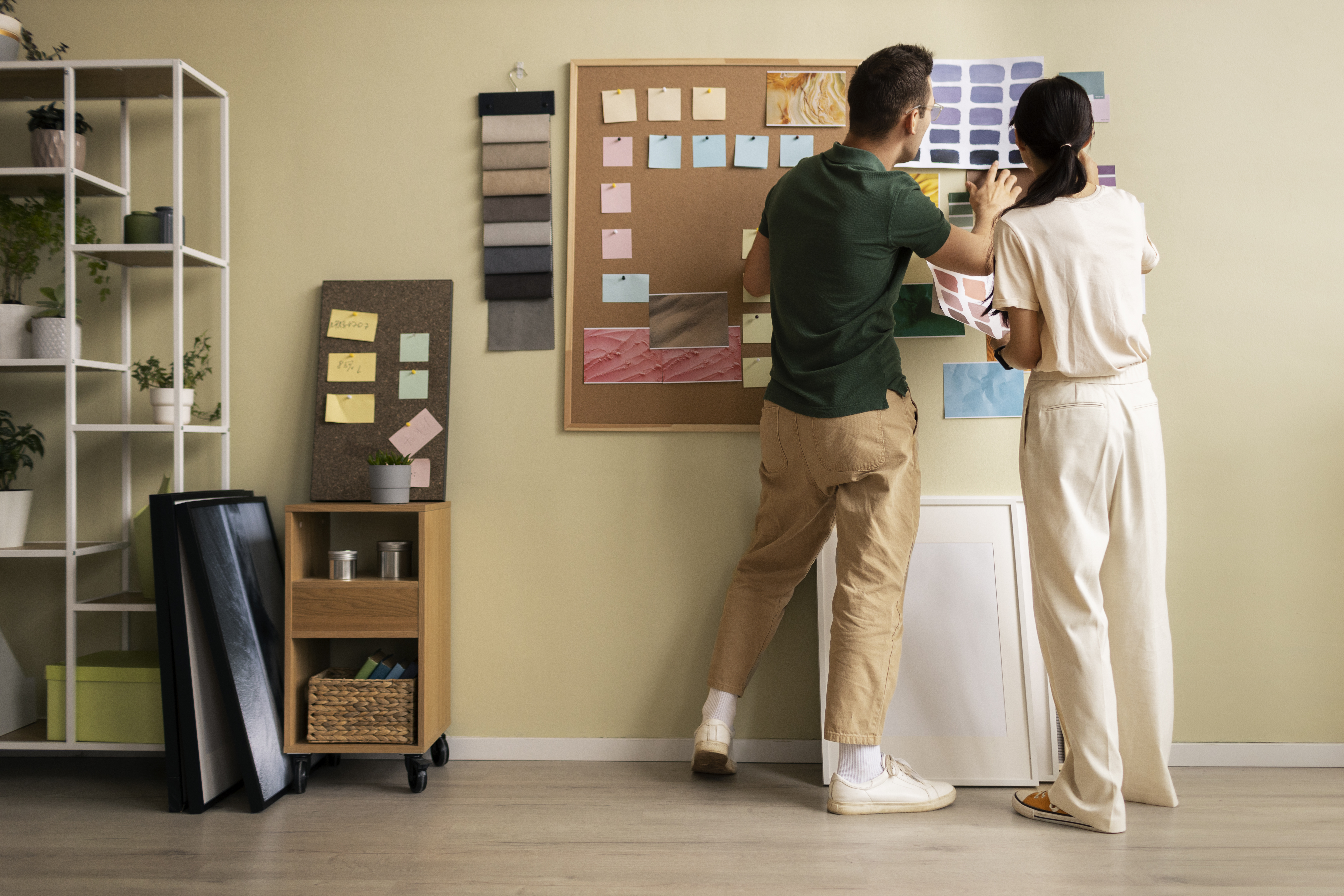 New construction design center with finishes, cabinets, and flooring samples.