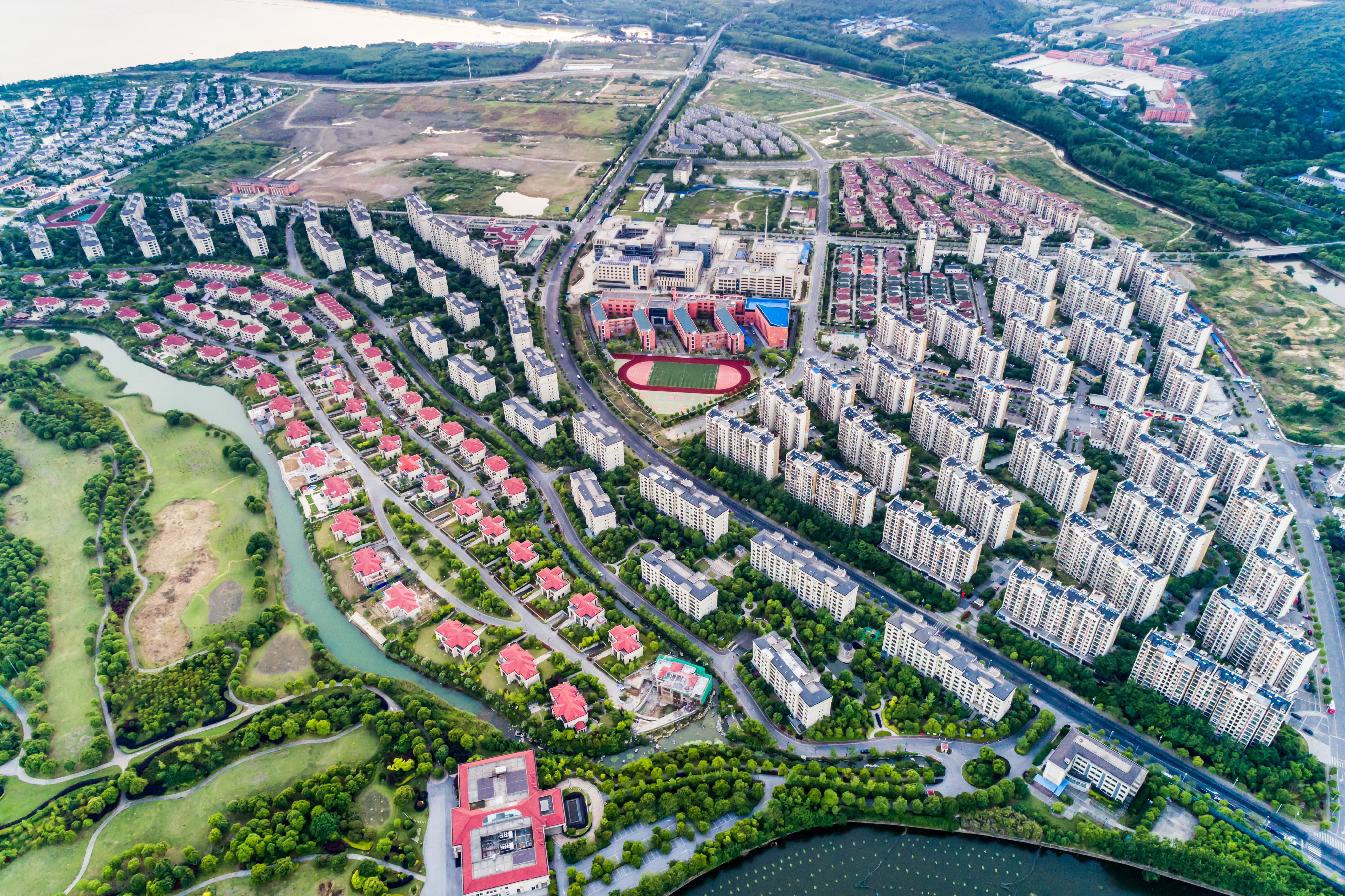 An aerial view of a modern build-to-rent community in North Texas featuring professionally managed single-family style homes with communal amenities.