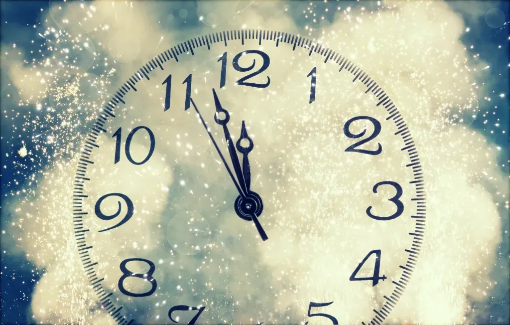 A large clock indicates it's almost 12 midnight