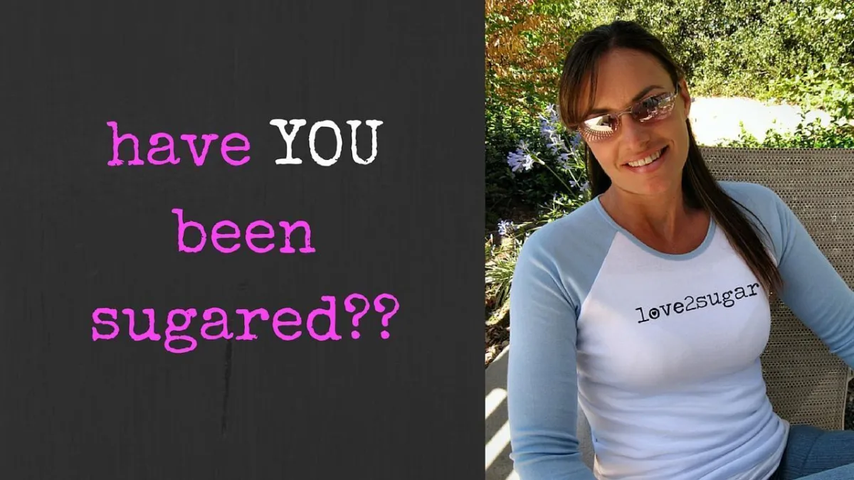 Smiling woman wearing sunglasses and a love2sugar shirt sitting outdoors, next to text that says 'have YOU been sugared??' on a black background.