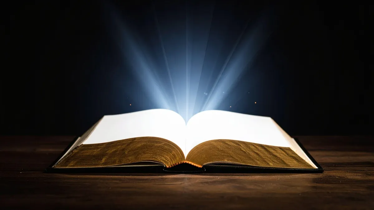 Open Bible glowing with light – Represents the Holy Spirit teaching and revealing truth.