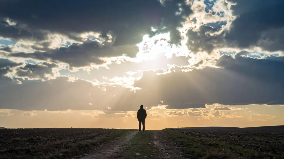 Believer walking in light toward cross – Symbolizes the necessity of the Holy Spirit in a Christian’s life.