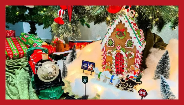 Gingerbread House underneath Christmas tree