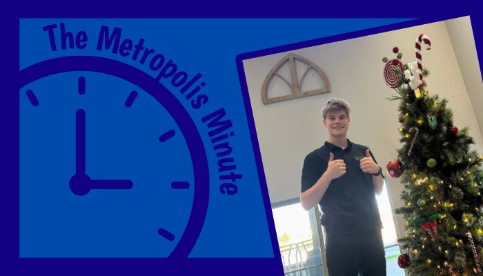 Metropolis Minute featuring a team member decorating for the holidays.