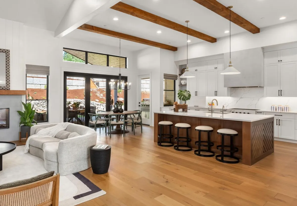 Rustic wide-plank hardwood flooring in a cozy family room.