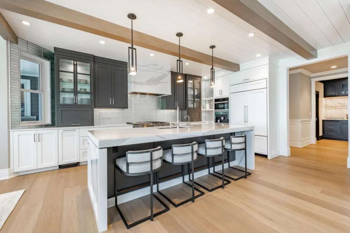 Polished hardwood floor with elegant area rug.