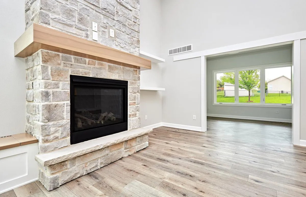 Warm-toned laminate flooring complementing cozy interiors.
