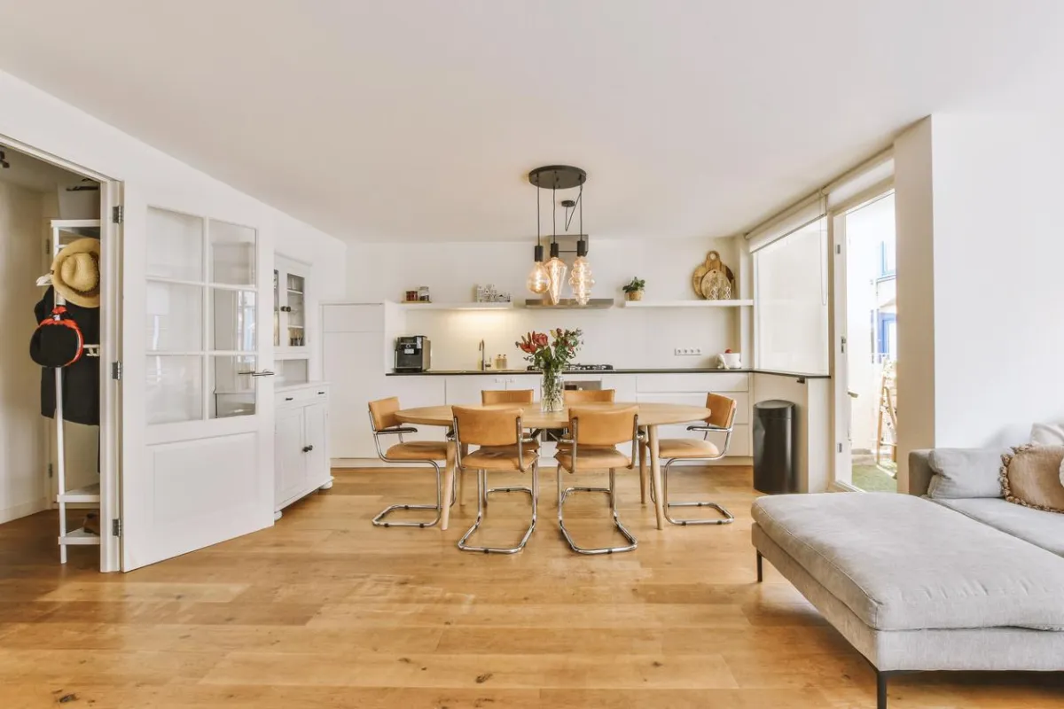 Glossy laminate floor in a bright dining room.